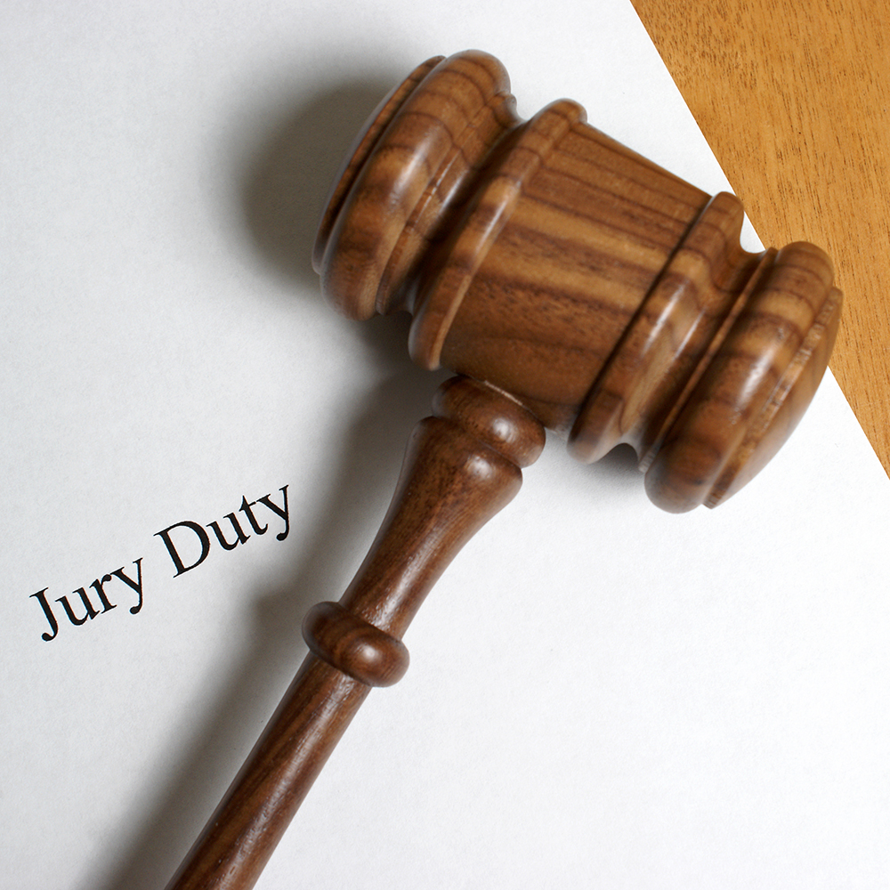 Being Away On Jury Duty Feature Image - East Coast Legal Group